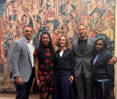 A picture of Tony Bishop, scholarship founder, Emerald Garrett, scholar, Seth Washington, scholar, Dinah Rose, Magdalen College President, Maxine Albert, Volunteer