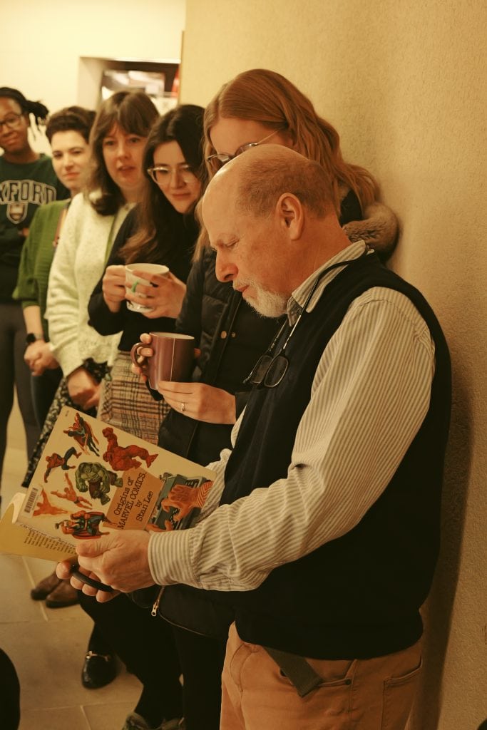 Peter Kessler and a Comic from the 1970s that he has donated to the collection